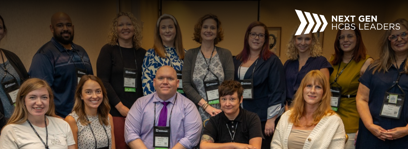 A group of professionals pose for a picture. the next gen logo sits on the image.